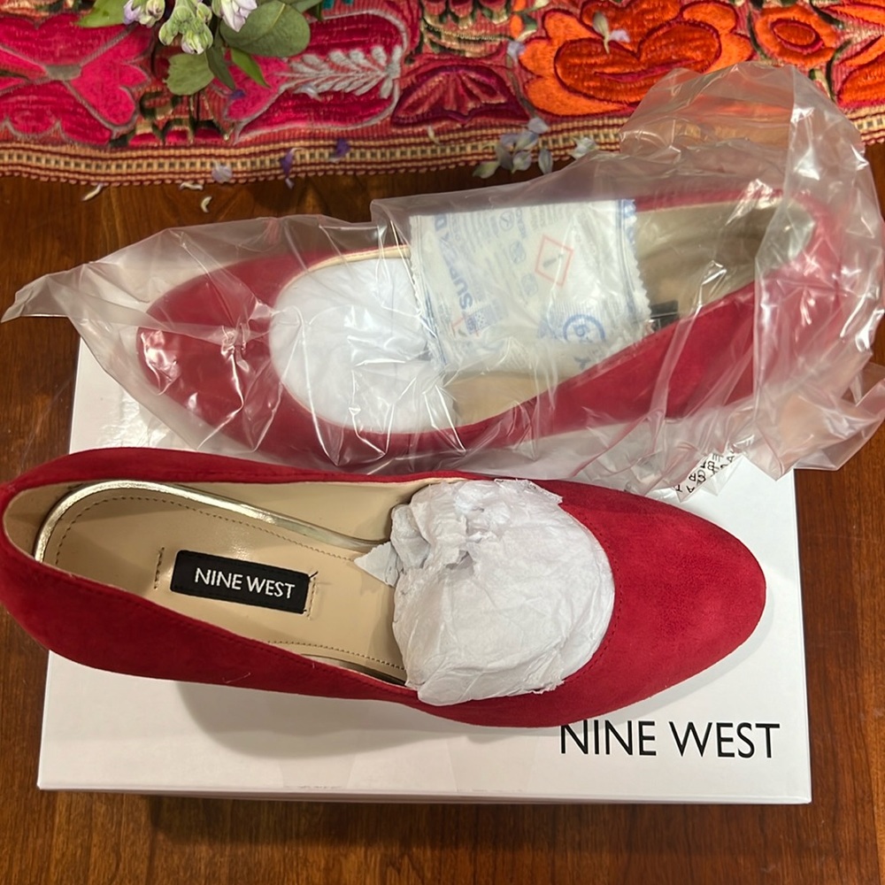 Red Nine West heels.